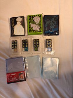 Pokémon card sleeves and dice