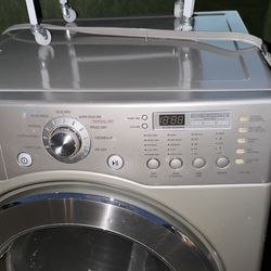 Free electric dryer (still works but makes loud noises)