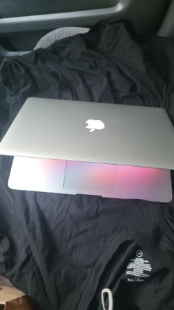 MacBook Air 13 in with charger I can deliver