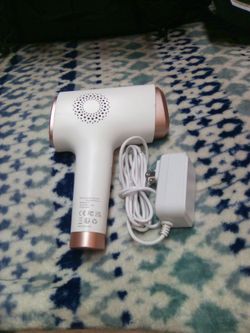 Handheld intense pulse light hair remover