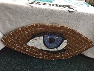 3 sides mosaic pyramid , and eye