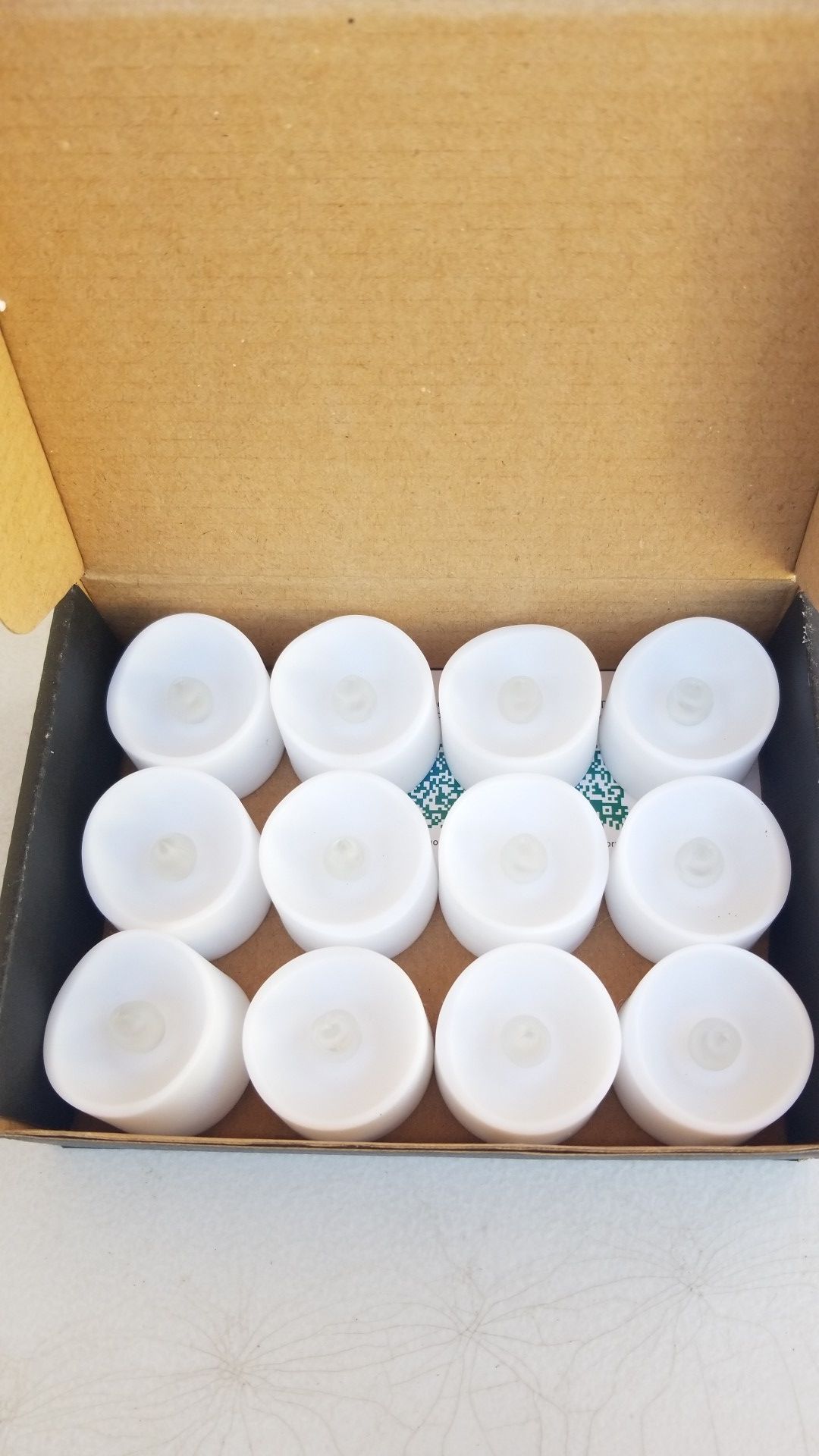 Box of 12 LED tea lights.