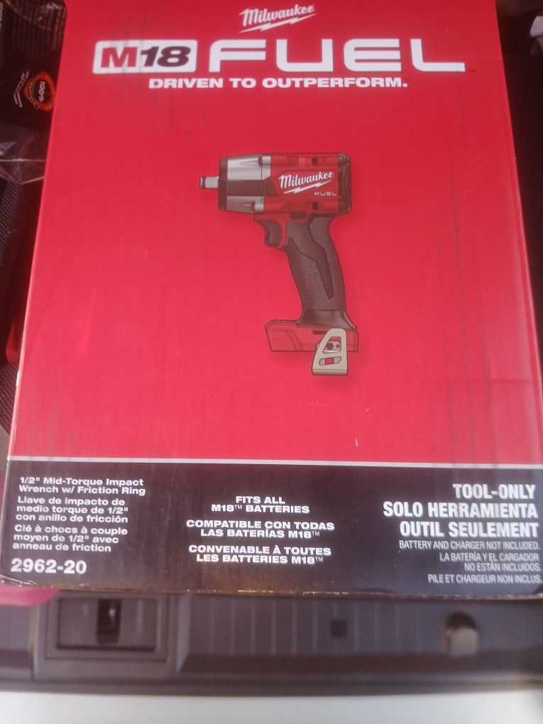 Unopened Milwakee 1/2" Mid Torque Impact Wrench W/ Friction Ring (Tool Only)