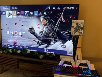 PS5 and AAA game and one controller