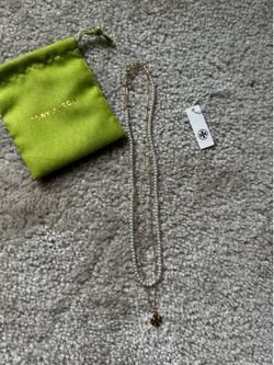 Tory Burch pearl necklace with logo pendant