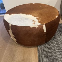 Cowhide ottoman 32” $100