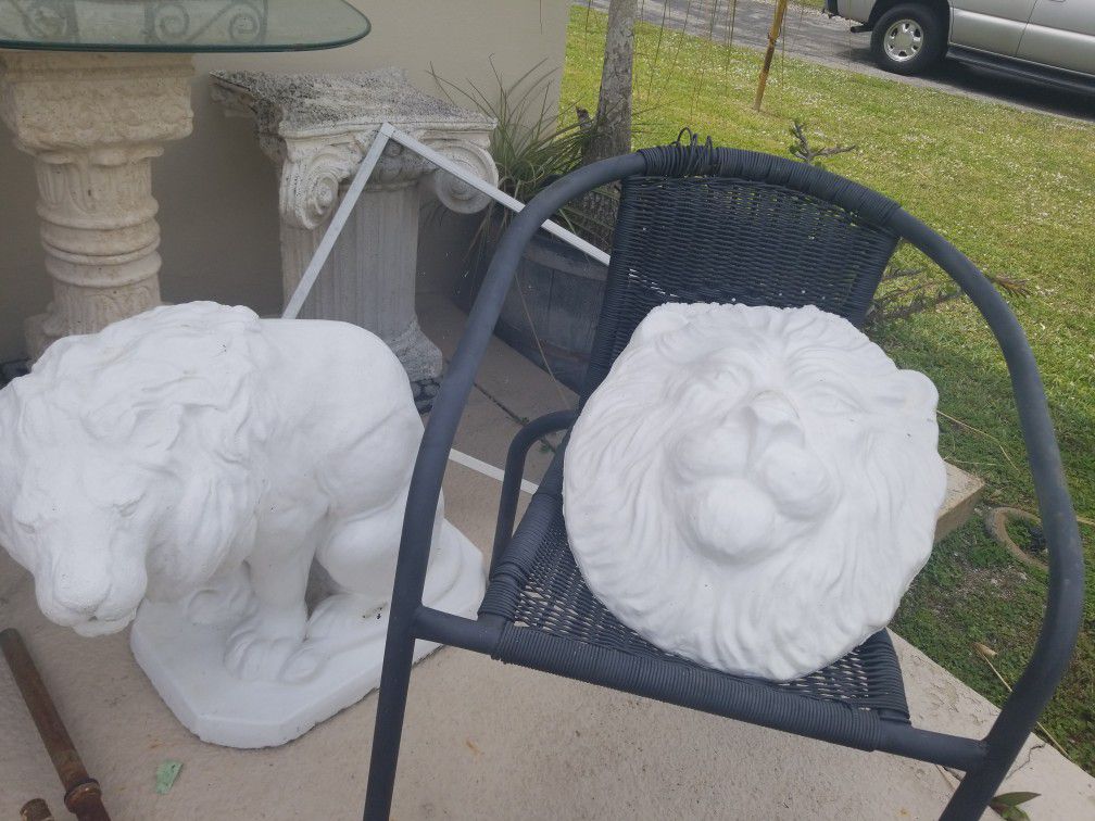 Concrete and hanging lions $75.00