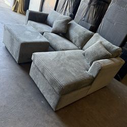 Brand New Grey Corduroy Sectionals With Free Ottoman 