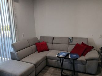 Pre-owned sectional sofa/sleeper