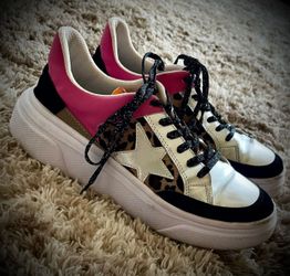 Golden Goose Superstar with leopard star, silver glitter, and hot pink laces