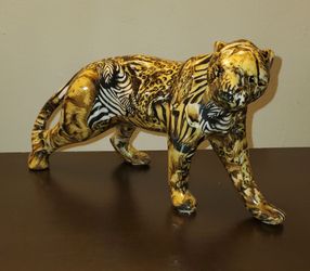 "Patchwork" style safari porcelain or ceramic figurine.