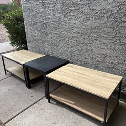 Beige and black coffee tables