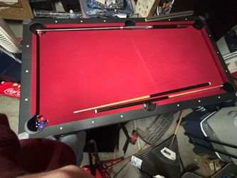Small sized red pool table