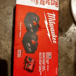 Milwaukee 5.0 Batteries And Charger. 