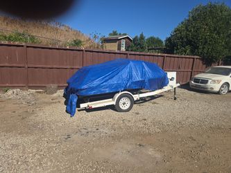 TWO JET SKI AND TRAILER