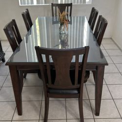 Table with glass and chairs