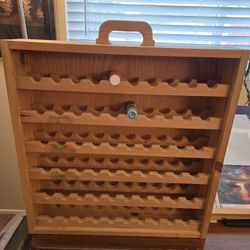 Custom-made painters, rack holds 60 bottles.