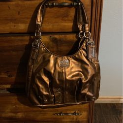 Very Nice Bronze Coach Purse Like New