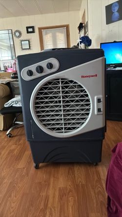 Honeywell CO60PM portable evaporative cooler dark grey, 25”x16”x38” 200 OBO