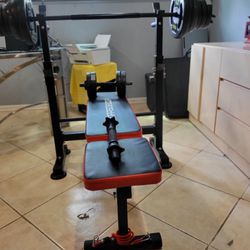Bench With Bar And  Weights And 2 Dumbbells