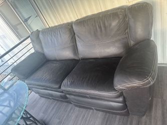 Dark brown leather recliner couch