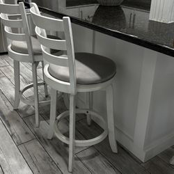 Three Swivel Counter Stools