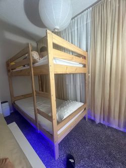 Cute bunk bed  including mattresses and brand new sheets