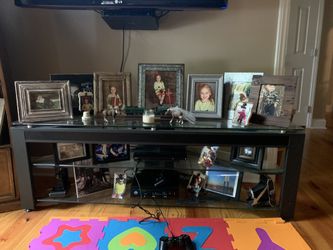 Black metal tv stand with glass tops