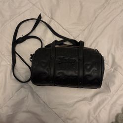 Black “Juicy Couture Women’s Puff Roll Crossbody Bag”