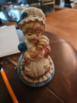 Vintage "Mother/Nanny holding a Baby