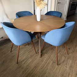 Round Wood Dining Table + Upholstered Navy Chairs