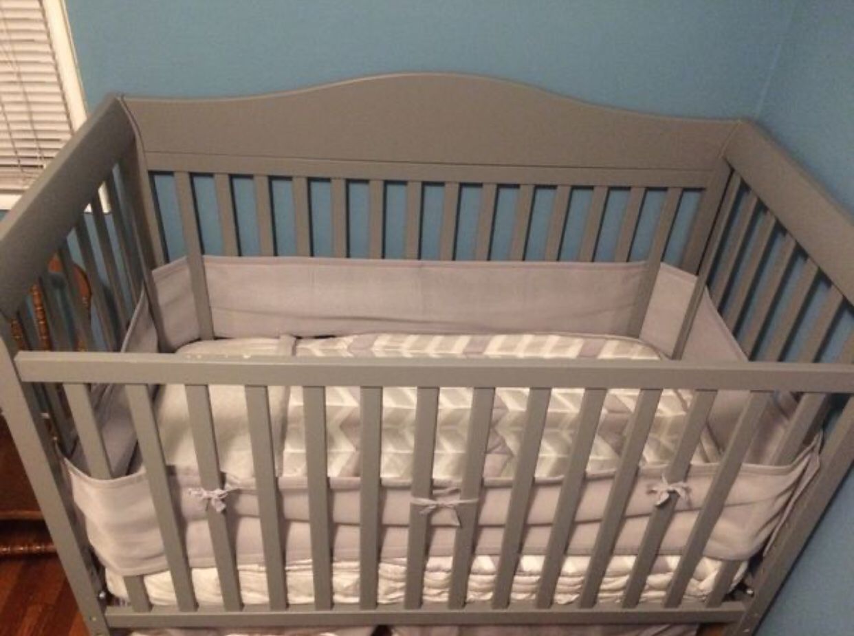 Baby Crib, Changing Table, and Dresser