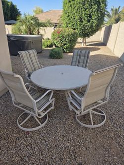 Outdoor Patio Dining Set – 54 Inch Stone Top, Swivel & Rocking Chairs
