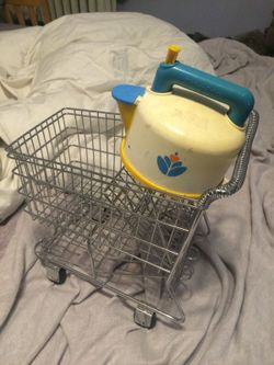 Vintage whistling toy tea kettle and miniature shopping cart great for the play kitchen set