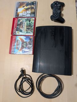 PS3 Slim and 3 games