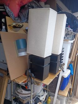 A pair of rectangular table lamps with shades