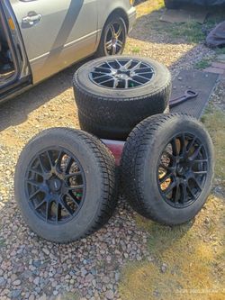 Bridgestone Winter Tires on Voxx Black rims– Set of 4