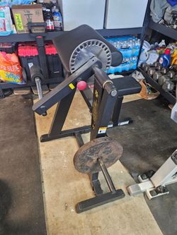 Body solid preacher curl/ tricep machine  with 25 pound plate