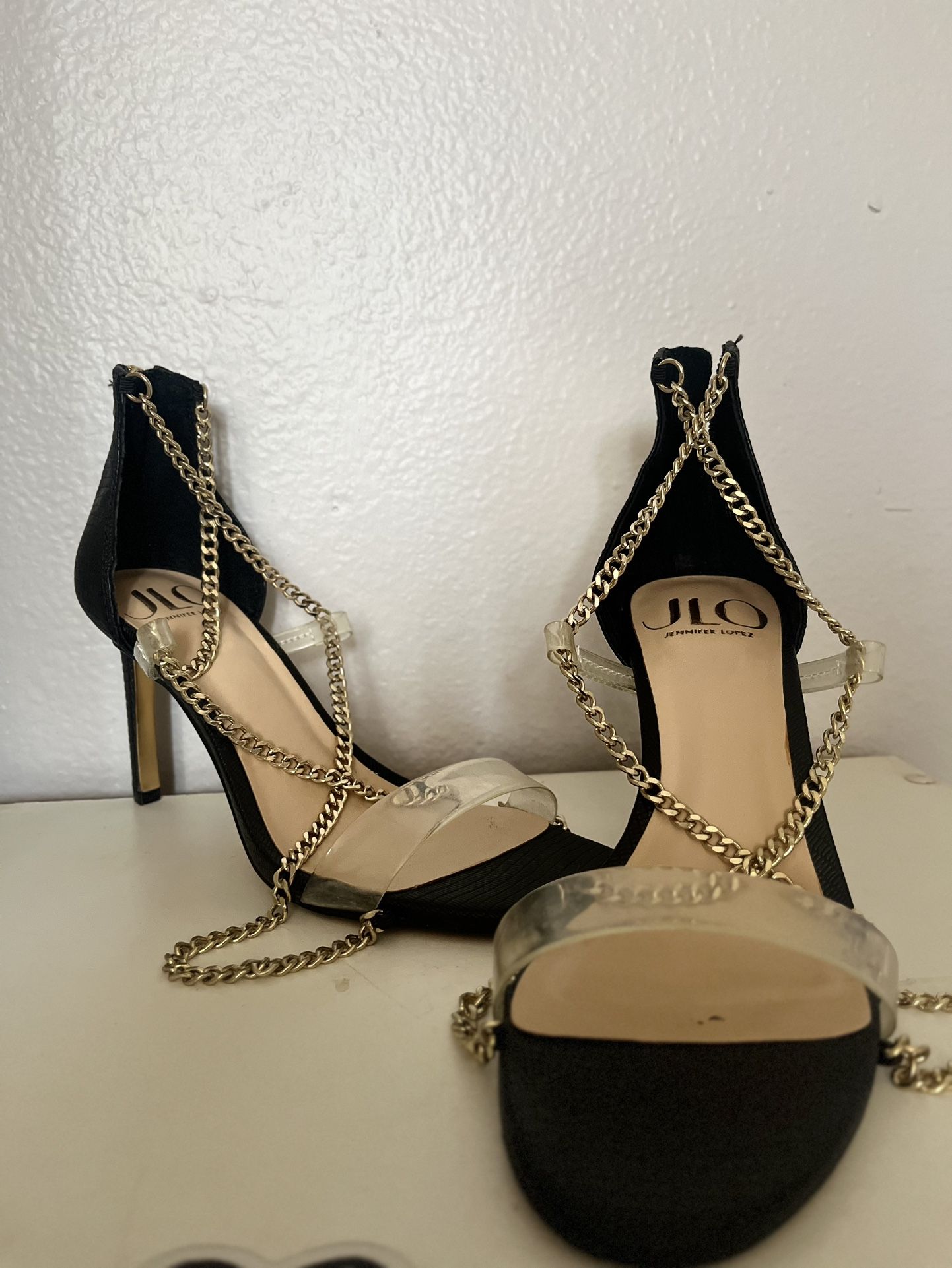 JLO black heels with gold chain