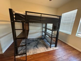 Teen bed with attached desk and book shelf.