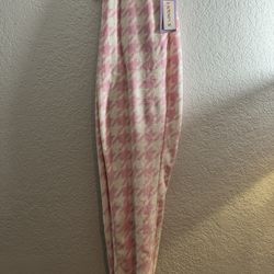 Joyspun pajama pants feature a soft, pink and white houndstooth pattern