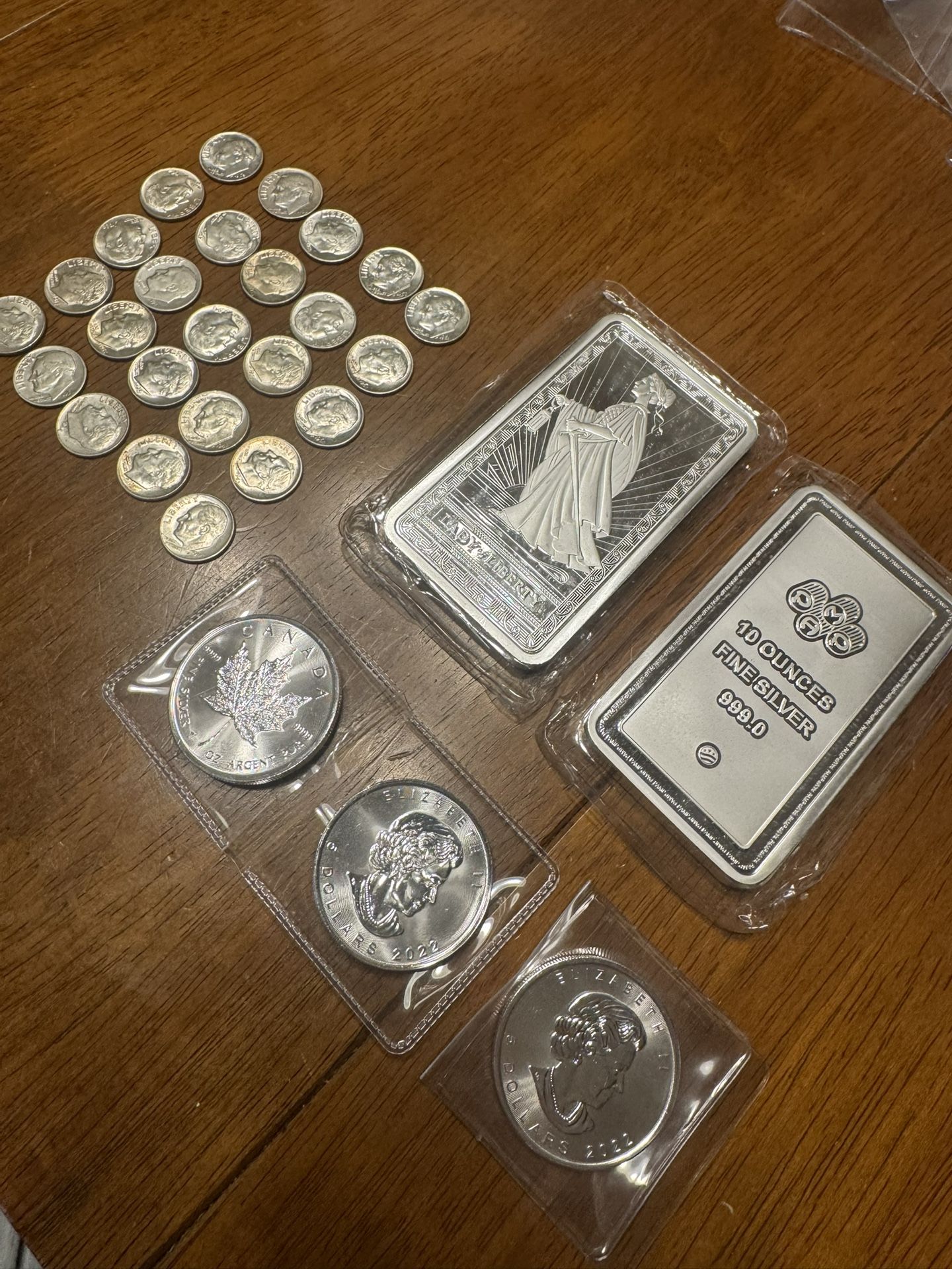 Silver 23 Ounces Plus 25 Dimes