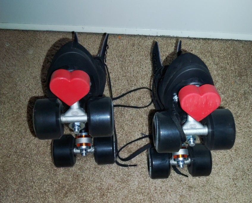 Black Moxi Roller Skates With Two Sets Of Toe Stops