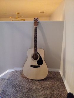 Yamaha f310 acoustic guitar with tuner