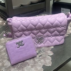 PURPLE/LAVENDER JUICY COUTURE HAND BAG