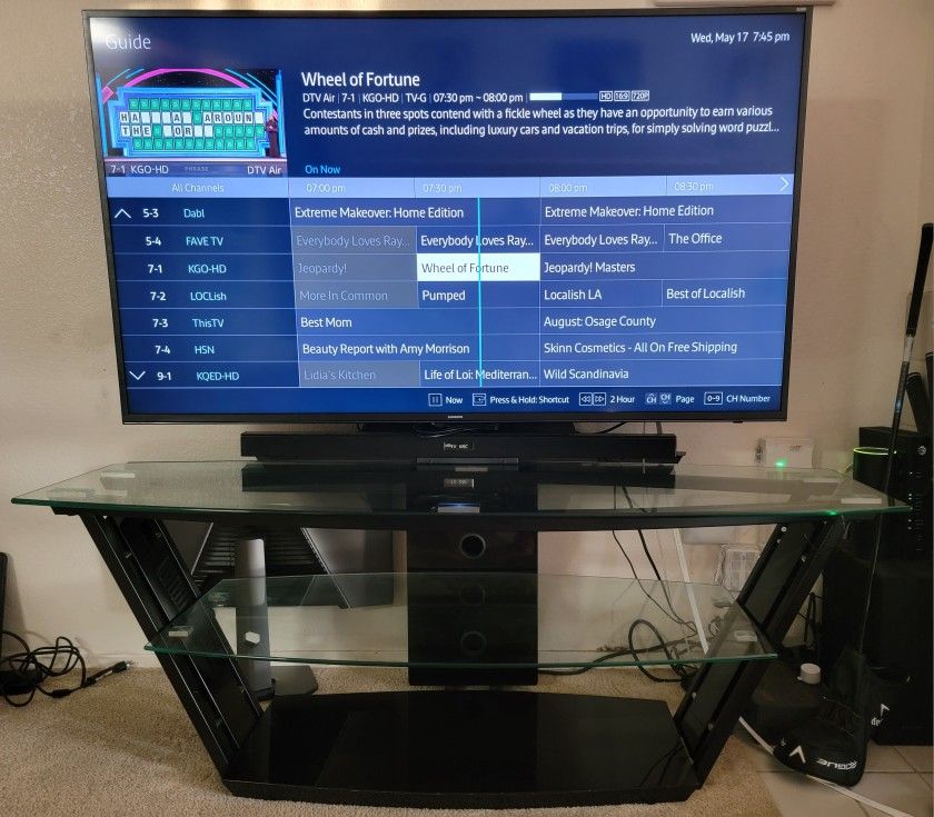 Used, 55 inch Samsung  SUHD TV  with tempered glass tv stand  $350