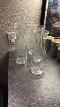Five Clear Glass Serving Bottle