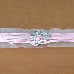 BRAND NEW IN PACKAGE LADIES PINK LEATHER MULTI CHARM BRACELET INFINITY SYMBOL HEARTS PINK PEARL WOVEN IN BRAIDED CUFF WITH EXTENDER
