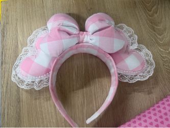 Mickey Ears- pink and white gingham fabric with white lace trim and a large, puffy bow