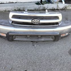 96-2002 Toyota 4Runner Front Bumper With Grill And Emblem And Fog Lights With Accessories OEM.